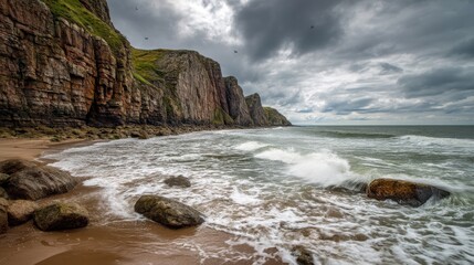 The dramatic beauty of a cliffside beach overlooking the vast sea