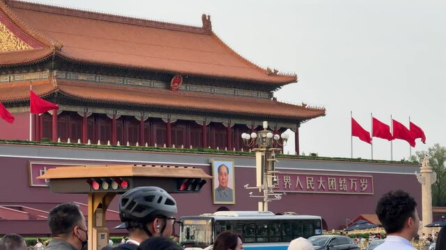 Beijing, China - April 17, 2025: People biking around Tiananmen 