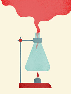 Flask on burner releasing red smoke