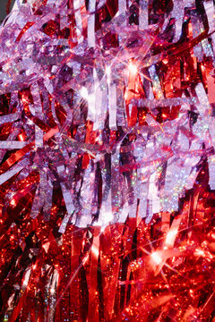  Pink and Red Backdrop Tinsel Curtain in the sunlight