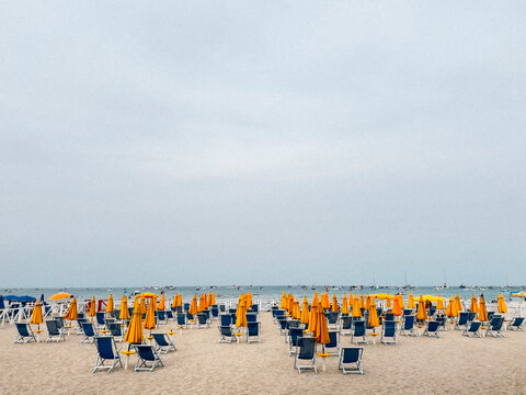 Serene Beachscape with Yellow Umbrellas in Palermo 