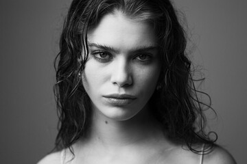 Expressive bw portrait of a model posing in studio
