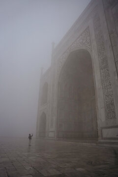 Silhouette of a man on the background of the Taj Mahal