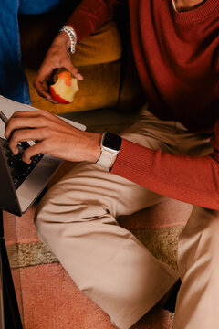 Hand of an anonymous professional typing on a laptop 
