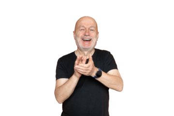 A man laughing and applauding