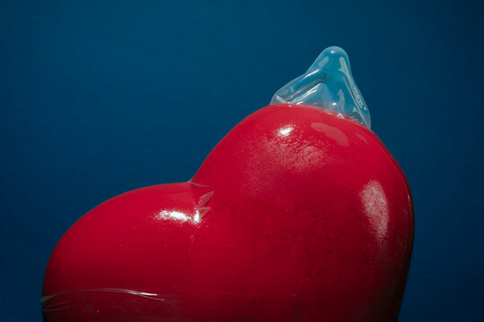 heart covered by a condom