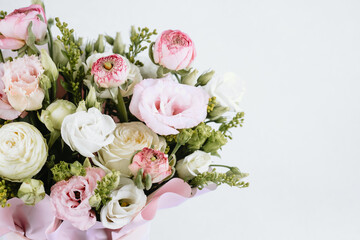 Beautiful floral arrangement featuring pink and white flowers in a soft setting