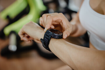closeup sport people wearing wrist smart watch health data tracker or exercise HR measure device