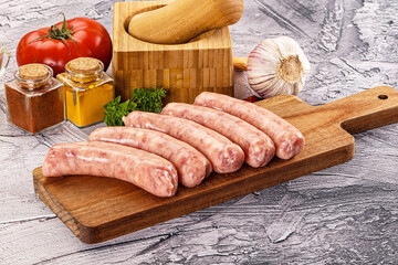 Raw meat sausages for grill
