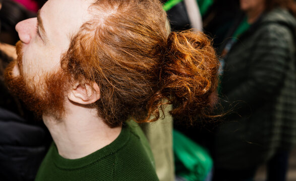 Close up of red hair of man in Chicago during St Patrick's Day