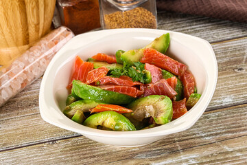 Salad with avocado and salmon