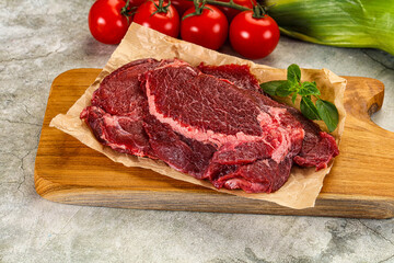 Raw beef cheeks cut for cooking