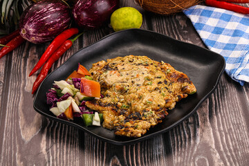 Tasty chicken steak with vegetables