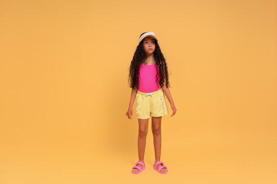 Confident girl in summer outfit Studio Portrait 