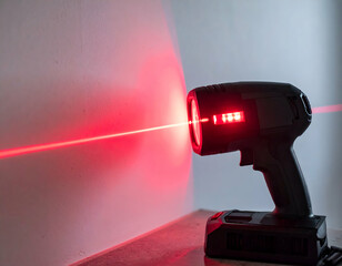 Red Laser Pointer Tool With Light Beam On Gray Background