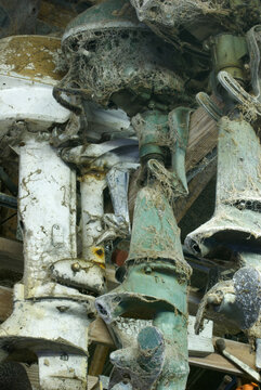 Old antique outboard boat motors rafters marina cobwebs spiderwebs