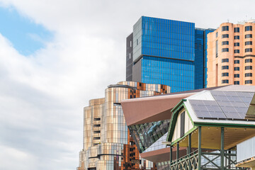 Adelaide Riverbank skyline viewed across Torrens river from Victoria Bridge on a day