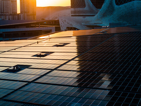 City Rooftop with Solar Panels and Urban Buildings