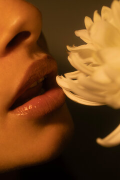 Curly hair tangled in a flower