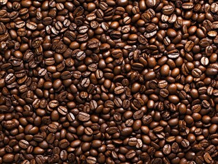 Fototapeta premium Aromatic coffee beans background with rich brown hues and inviting texture perfect for coffee lovers