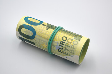 European currency, banknotes rolled into a roll.