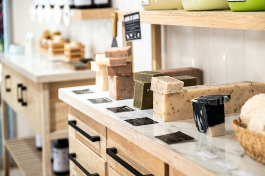 Artisan soap display in natural wood interior shop