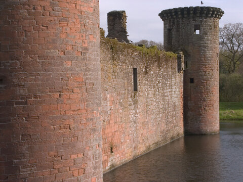 Wall Caerlaverock Castle Dumfries Scotland spring evening moat
