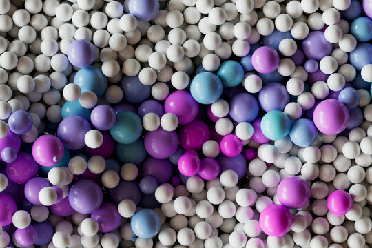  Purple and blue plastic balls arranged in a wavy pattern