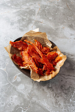 Spicy Dried Meat Jerky on Parchment Paper