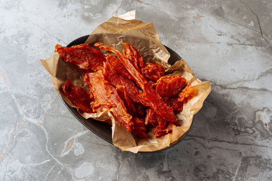 Spicy Beef Jerky in Black Bowl