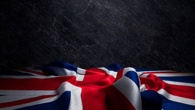 Dramatic UK Flag Draped on Textured Stone Wall: A Symbol of British Pride. Premium Background with copy-space
