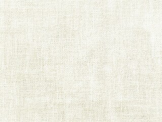 Fototapeta premium Close-up view of a light beige linen texture.