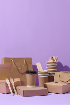 Eco-conscious disposable utensils and packaging arranged on table