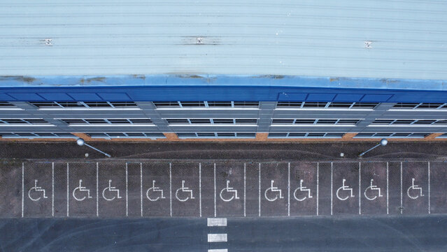 Drone shot of disabled parking in front of a business