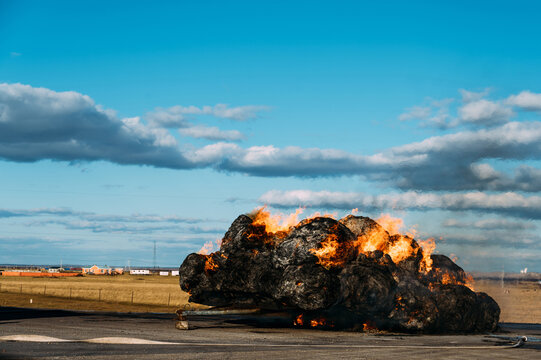 A pile of burning grass
