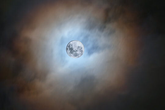 Moon surrounded by clouds