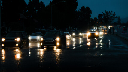 Cars Driving on a Rainy Day