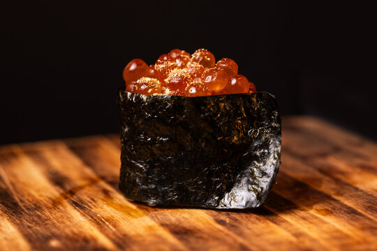 Sushi Ikura Gunkan delicacy with seaweed and salmon roe