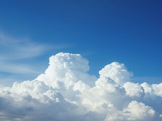 an image of a plane flying through a cloud filled sky, there is a plane flying in the sky with a lot of clouds