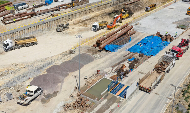 Wide View of Active Construction Site with Equipment and Materials