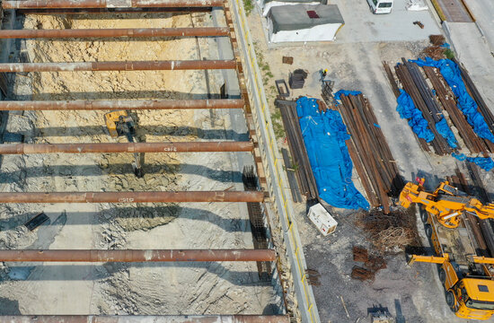 Aerial View of Construction Site with Excavation and Heavy Equipment