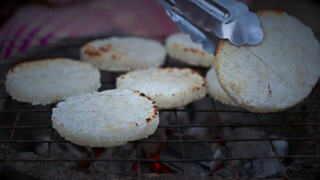 Food Series : Grilled sticky rice or grilled rice on the stove. Local food in rural Thailand. Khao jee. Thai style street food.