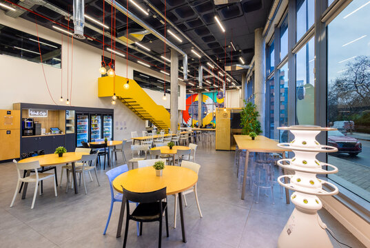 Modern workplace cafeteria with colorful decor