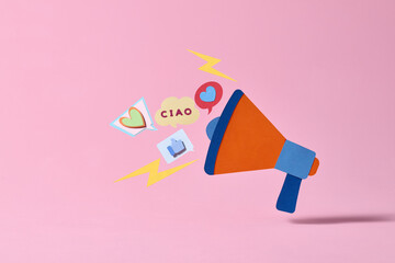 A paper megaphone shouts out social media love, likes and greetings