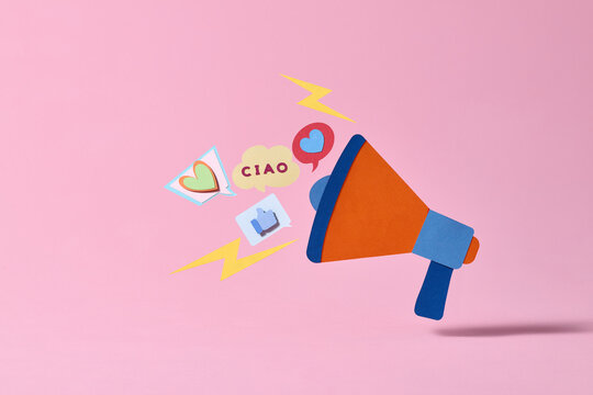 A paper megaphone shouts out social media love, likes and greetings
