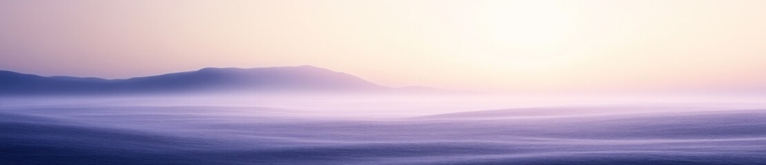 Fototapeta premium Misty sunrise over mountains; calm landscape