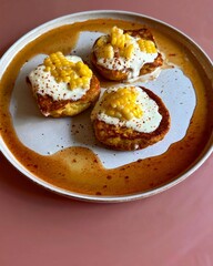 "A dreamy pink-themed dessert spread featuring strawberry macarons, raspberry panna cotta, and rose latte art, arranged on pastel pink marble with fresh petals."

