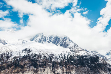 Discover the scenic viewpoint and panoramic views of the Montenvers Mer de Glace and Mont Blanc mountains, and the red train in Chamonix, Haute-Savoie, France.