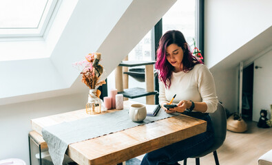 Woman planning her day at home