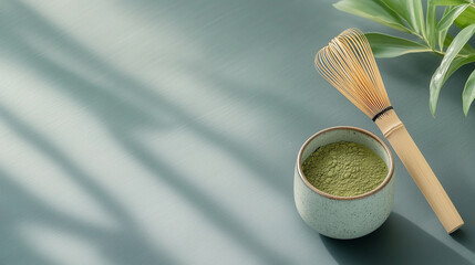 Serene matcha preparation with whisk and bowl